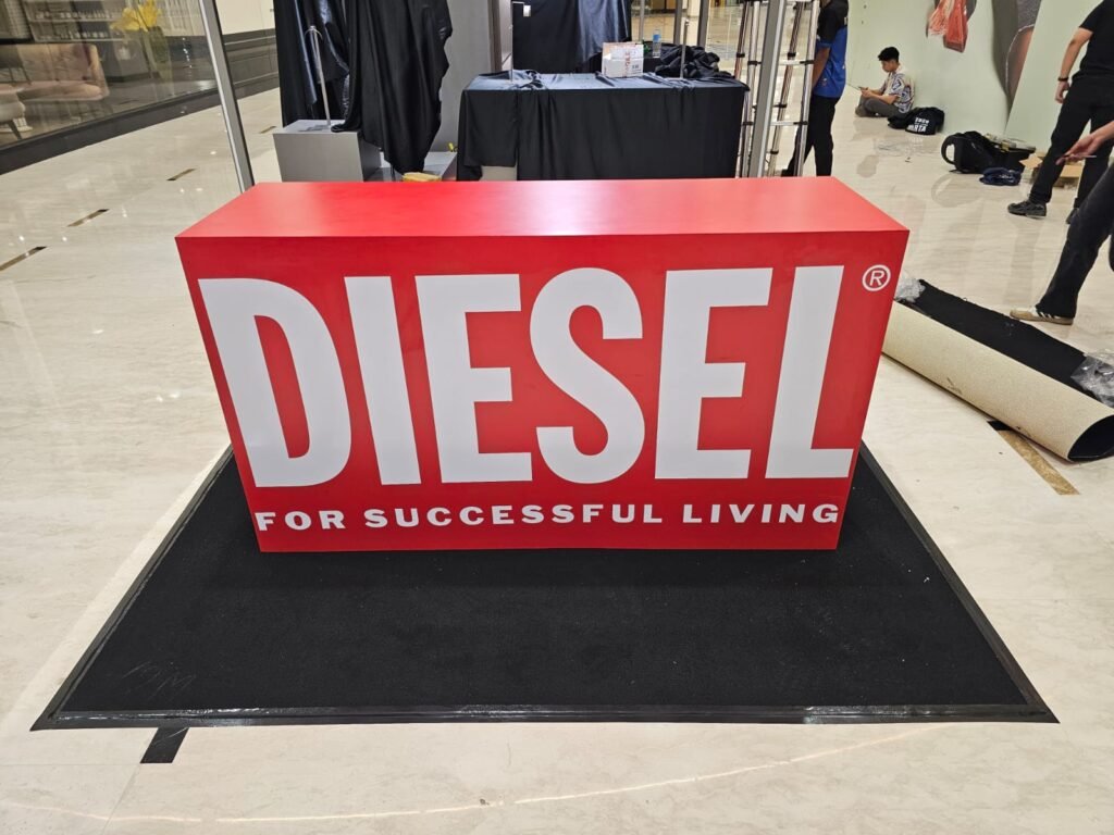 meja bar custom 180 x 60 x 100 cm dengan branding DIESEL