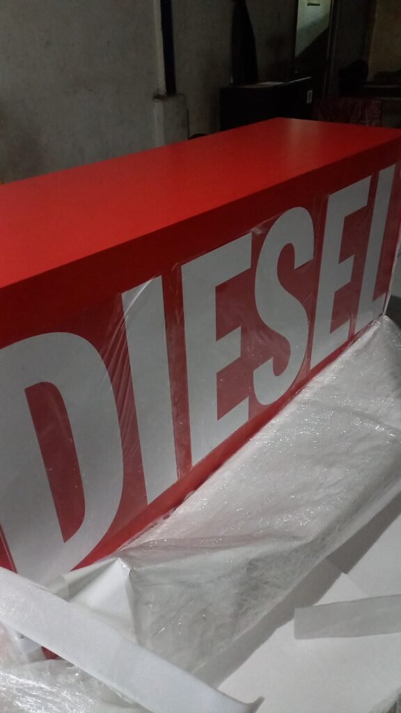 detail branding DIESEL pada meja bar custom